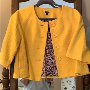 Cropped jacket with leopard lining